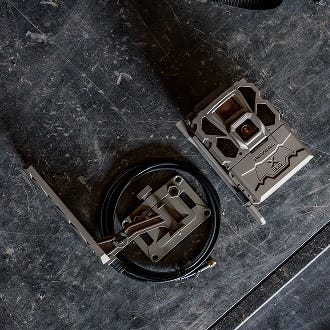 Extended Range Antenna 3.0 mounted above a REVEAL trail camera